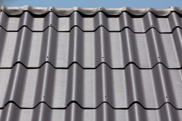 black roof tile top on residential house