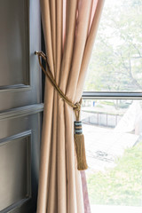 Curtains tassel for interior luxury house part of beautifully draped curtain