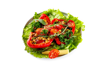 Closeup plate of fresh vegetables salad with tomatoes, corn, beans, pepper and parsley isolated at white background.