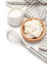 Traditional Mascarpone cheese and cream or milk isolated