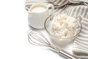 Traditional Mascarpone cheese and cream or milk isolated