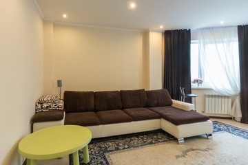 Living room interior with large sofa