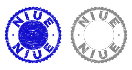 Grunge NIUE stamp seals isolated on a white background. Rosette seals with grunge texture in blue and grey colors. Vector rubber stamp imitation of NIUE label inside round rosette.