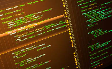 Php developing of the site in the code editor. Green php code on brown background, macro