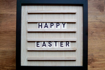 Happy Easter sign with wooden letters