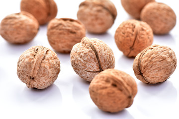 Walnuts on a white background.