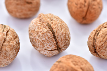 Walnuts on a white background.