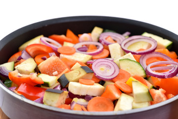 Sliced ​​fresh vegetables on the board. Healthy food.