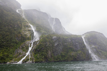 Misty falls at Milford Sound, New Zealand