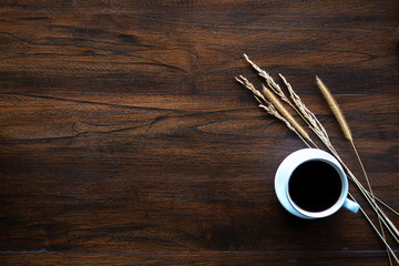 Coffee cup top view on wood desk, background