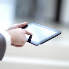 Close-up Of Businessperson Using Digital Tablet With Blank Disp