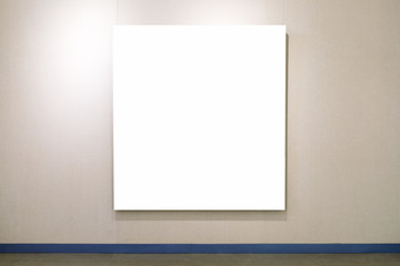 blank picture frame on exhibition wall