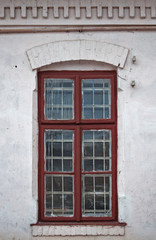 Fototapeta na wymiar old authentic windows on the facades of the houses of the city of Drohobych, Ukraine. 