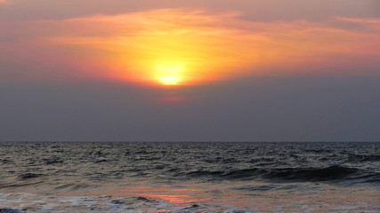 sunset on the beach in india