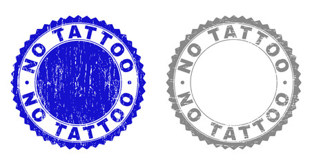 Grunge NO TATTOO stamp seals isolated on a white background. Rosette seals with distress texture in blue and grey colors. Vector rubber watermark of NO TATTOO text inside round rosette.