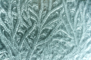 Natural pattern formed by frost on an outside glass table top