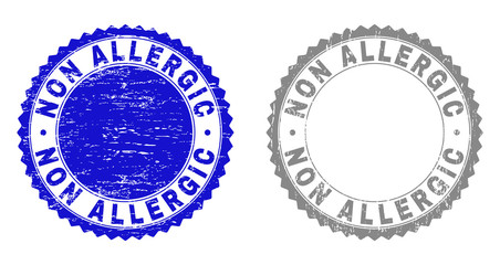 Grunge NON ALLERGIC stamp seals isolated on a white background. Rosette seals with grunge texture in blue and grey colors. Vector rubber watermark of NON ALLERGIC label inside round rosette.