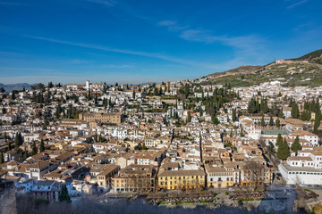 Fototapeta premium Panoramic view of the city of Granada and neighborhood of the Albaicin from the Alhambra, Granada, Spain