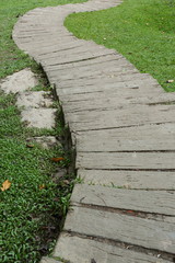 garden path walkway on green grass turf