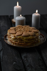 homemade honey cake, rustic style, candle lights