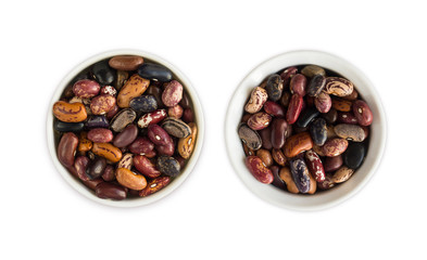 Kidney beans isolated on white background. Top view. Kidney beans in a wooden bowl isolated on white background. Kidney beans with copy space for text.