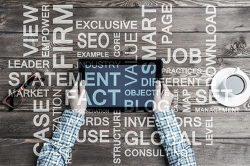 Close view of woman in checked shirt at her workplace