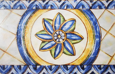 ODetail of the traditional tiles from facade of old house. Decorative tiles.Valencian traditional tiles. Floral ornament.