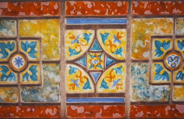 ODetail of the traditional tiles from facade of old house. Decorative tiles.Valencian traditional tiles. Floral ornament.