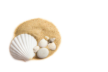 Round splash of sand, decorated with various seashells isolated on white, overhead studio shot. Tropical beach holiday destination design background concept.