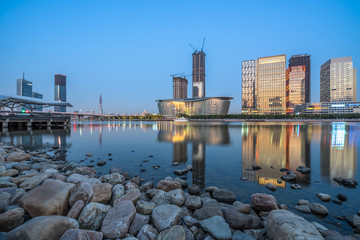 urban skyline and modern buildings at dusk, cityscape of China.