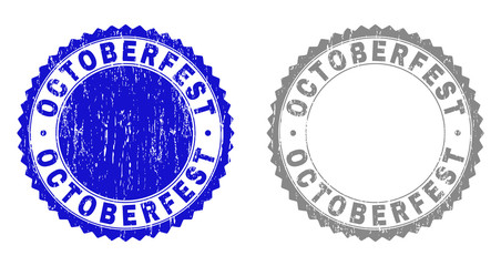 Grunge OCTOBERFEST stamp seals isolated on a white background. Rosette seals with grunge texture in blue and gray colors. Vector rubber stamp imitation of OCTOBERFEST title inside round rosette.