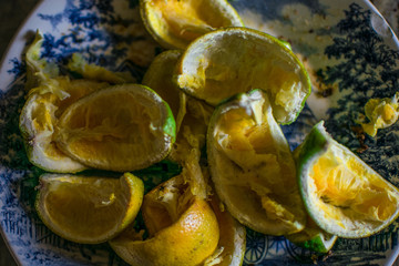 Rest of food, a plate full of orange bagasse in a dead nature style photo