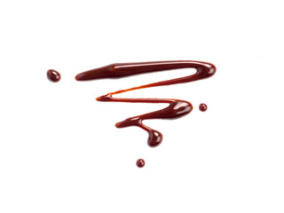 Chocolate sauce on white. Abstract lines made of chocolate or soy sauce isolated on white background