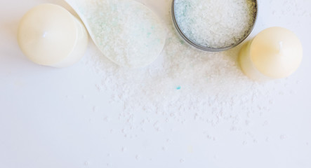 Spa treatments. Beautiful spa composition with  flowers on table close up. Spa still life with aromatic candles,candle background light  table relaxation spa beauty aromatherapy luxury closeup.