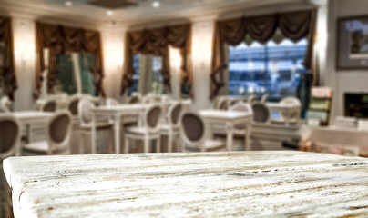 Fototapeta na wymiar Table background of free space and restaurant interior 