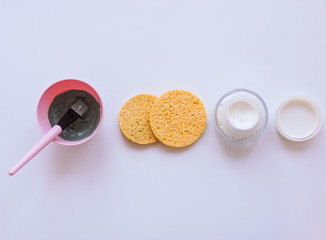 Clay mask for face and body. Dead sea mud mask - beauty products ingredients on light background, top view. Beauty concept. Flat lay. closeup texture of blue facial clay, copy space.homemade cosmetics