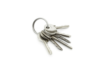 Silver keys on the ring on white background
