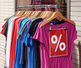 clearance sale clothes rack with a selection of fashion for women 