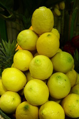 Fresh lemons built to a big lemon stand