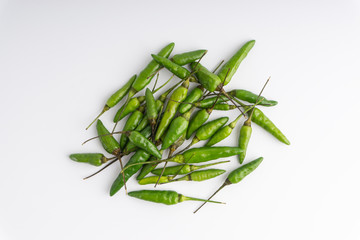 Green Bird's eye chili ,Thai Chili pepper ,bird chili pepper nature isolate on white background. Selective focus and crop fragment