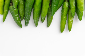 Green Bird's eye chili ,Thai Chili pepper ,bird chili pepper nature isolate on white background. Selective focus and crop fragment