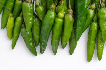 Green Bird's eye chili ,Thai Chili pepper ,bird chili pepper nature isolate on white background. Selective focus and crop fragment