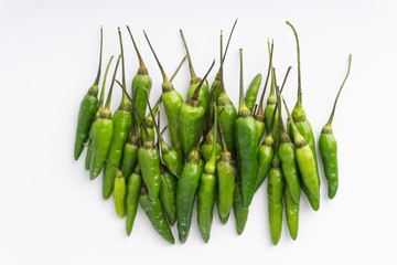 Green Bird's eye chili ,Thai Chili pepper ,bird chili pepper nature isolate on white background. Selective focus and crop fragment