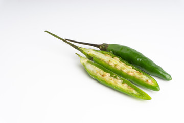 Green Bird's eye chili ,Thai Chili pepper ,bird chili pepper nature isolate on white background. Selective focus and crop fragment