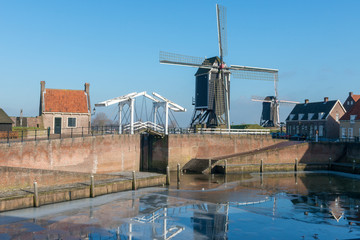 Drawbridge and windmills
