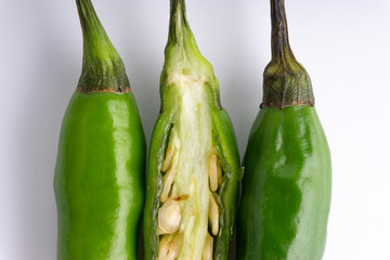 Green Bird's eye chili ,Thai Chili pepper ,bird chili pepper nature isolate on white background. Selective focus and crop fragment