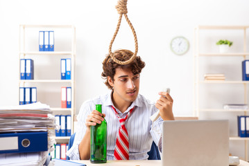 Desperate businessman thinking of committing suicide hanging