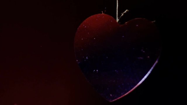 Single Heart condetti paper hanging in the air footage for yor projects.