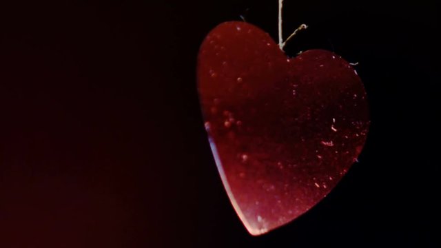 Single Heart condetti paper hanging in the air footage for yor projects.