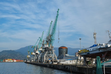 Fototapeta na wymiar Cranes in the port. Batumi, Georgia.